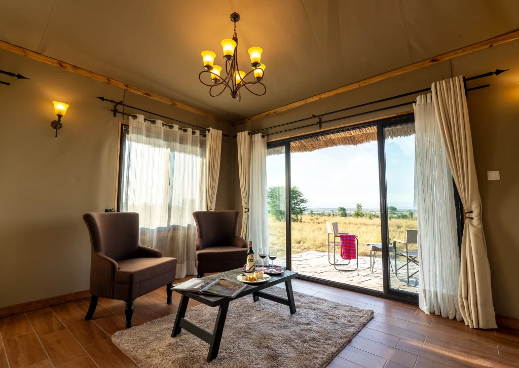 inside a double room at river camp by karibu camps